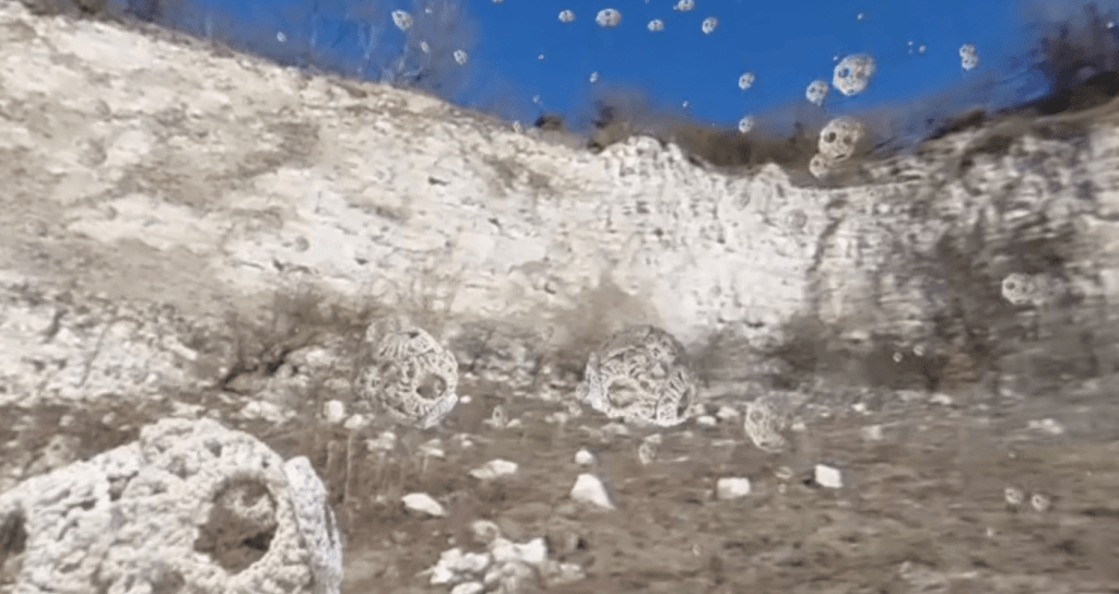 chalk particles fall on chalk pit